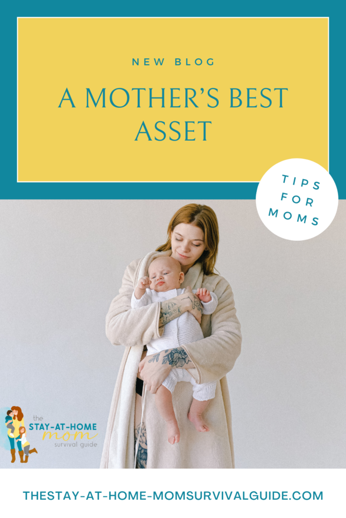 Mother holding baby. Text reads: New blog a mother's best asset tips for moms.