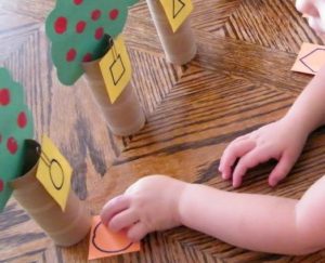 7 learning activities with cardboard tube apple trees that cover all ages from toddlers to school age kids.