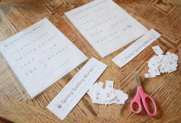 Spring spelling game cards with letters cut apart.