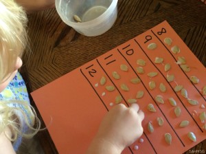 Counting and gluing pumpkin seeds-fine motor, number recognition, gluing practice. Essential skills for preschool in a pumpkin and Fall theme.