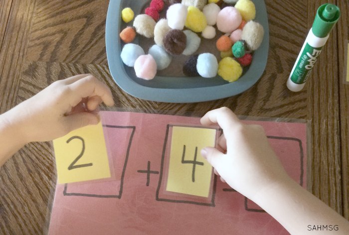 Explore addition with a hands-on addition busy bag for practicing addition concepts, counting and number identification for children in kindergarten or as young as preschool. Adaptations included for younger children.