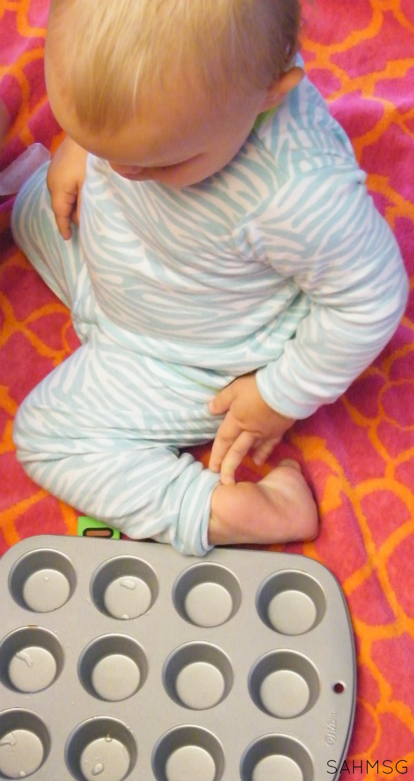 Ice and muffin tin fine motor and sensory activity for infants that is a quick one to put together and clean up.