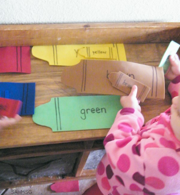Crayon color sorting activity for toddlers at home.