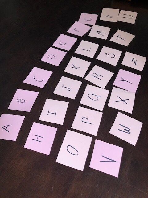 DIY Alphabet Memory Game activity for kids learning uppercase and lowercase letters.
