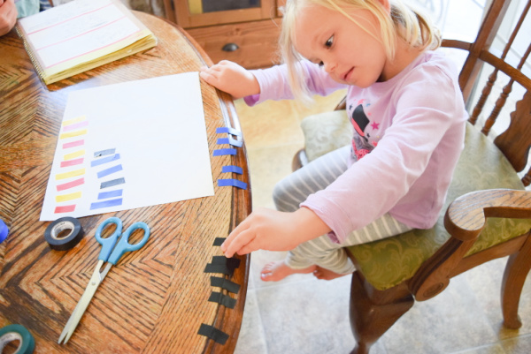 Teaching patterns in preschool with electrical tape is an easy and fun way to enhance preschool at home. So inexpensive too!