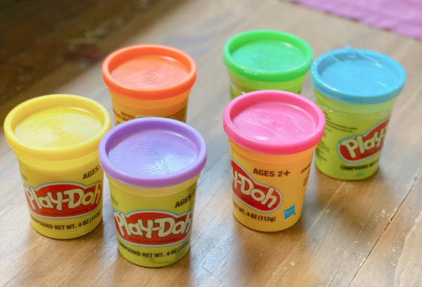 Playdough colors help children study the rock layers and rock cycle in this hands-on geology activity for homeschool.