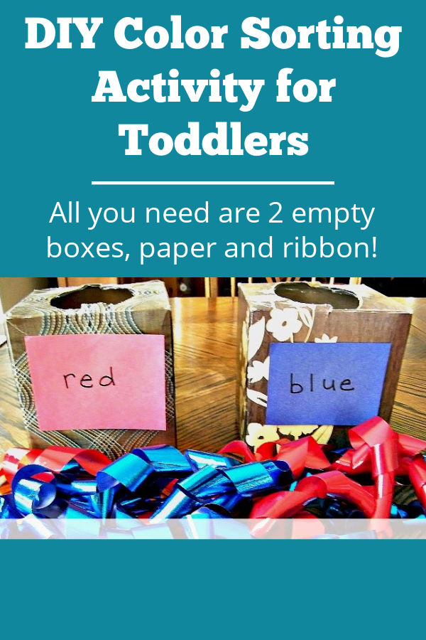 DIY color sorting activity for toddlers that takes two empty boxes and ribbon or paper scraps to make a hands-on learning activity for toddlers at home.