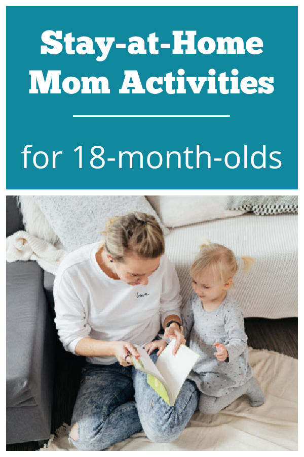 Mom kneeling with toddler looking at a book. Title reads Stay-at-Home Mom Activities for 18-month-olds.