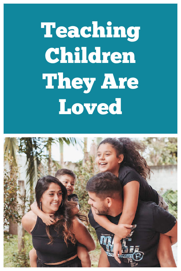 Family of mom, dad and two kids laughing together. Text reads Teaching Children They are Loved.