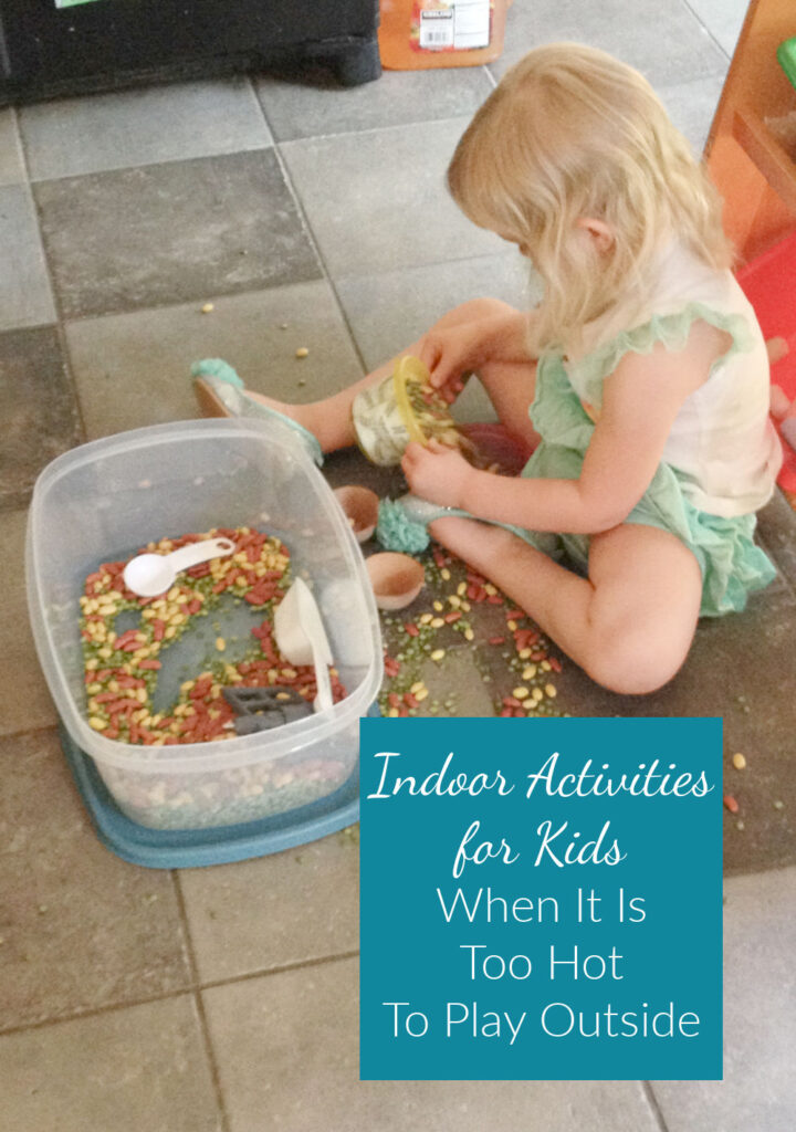Indoor activities for kids when it is too hot to play outside or a rainy day outside. Playing with a dry sensory bin on the kitchen floor makes clean up easier.