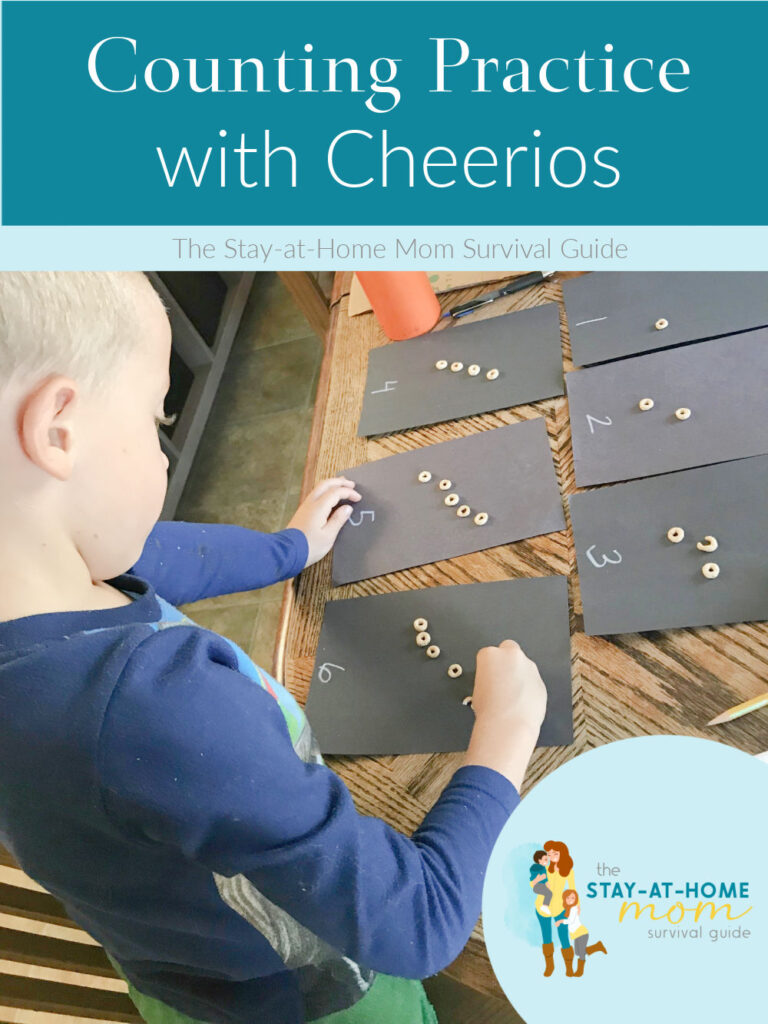 Boy placing cheerios cereal onto cards labeled with numbers. Text reads counting practice with cheerios.