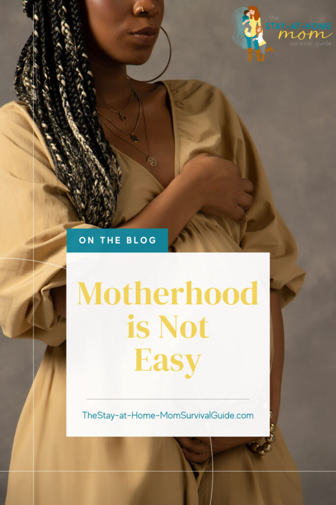 Pregnant woman of color holding her belly text reads motherhood is not easy. New on the blog.