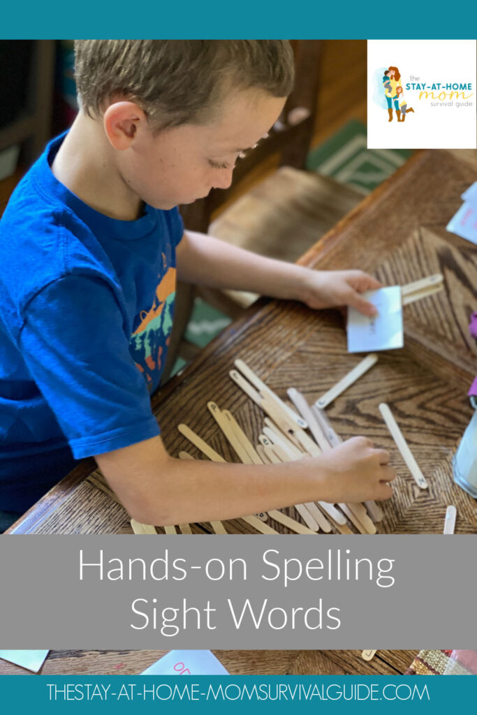 Boy placing craft sticks into pockets to spell number words.