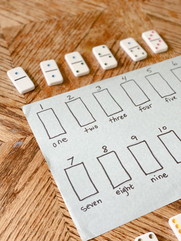 DIY domino matching mat with numbers and number words.